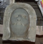 Sculpting the skin on the life mask...